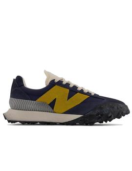 Zapatilla New Balance  UXC 72 Azul y amarillo