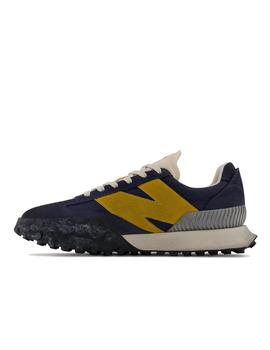 Zapatilla New Balance  UXC 72 Azul y amarillo